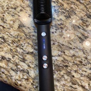 Heated brush